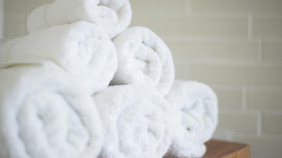 stack of rolled white towels